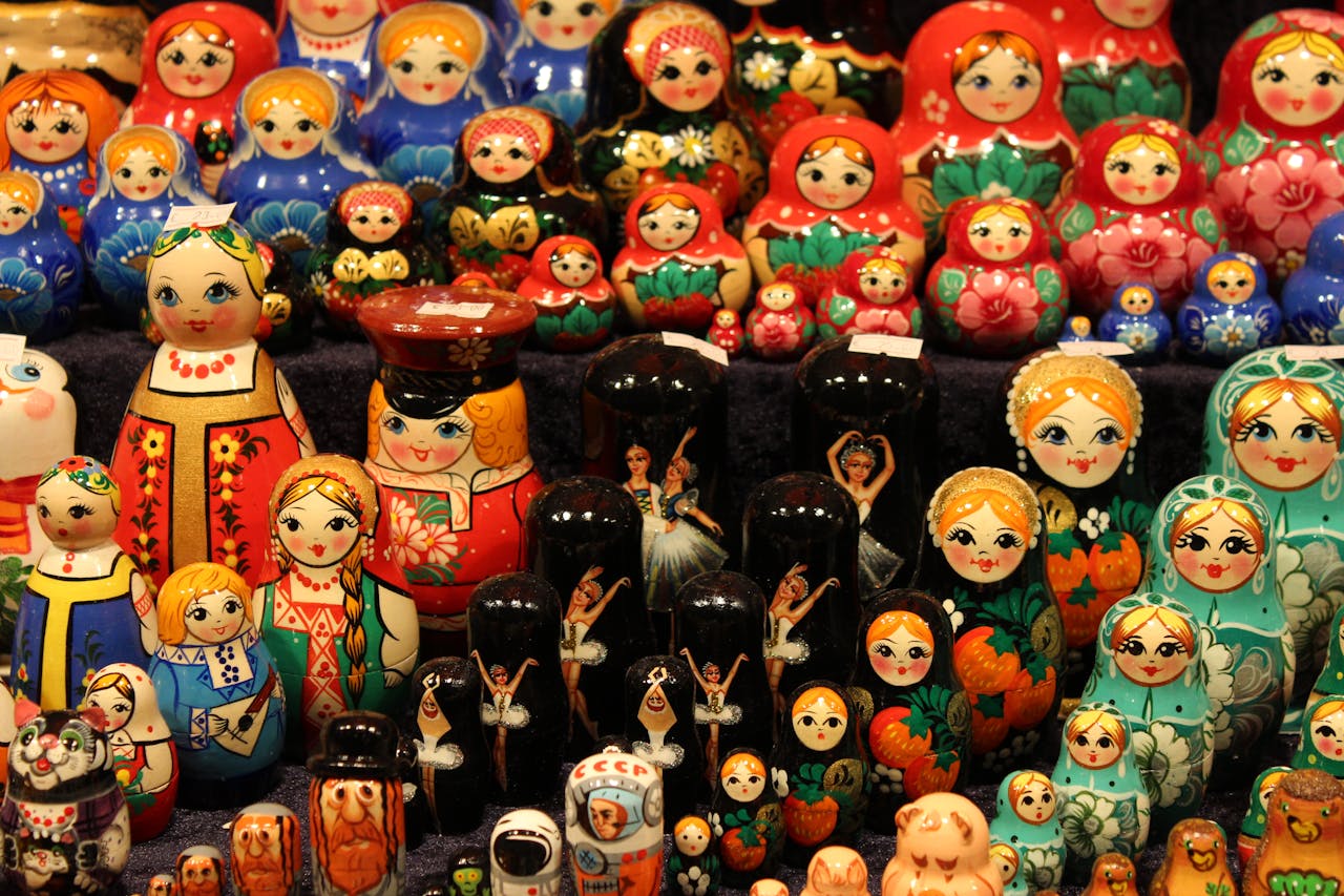 Colorful collection of traditional Russian matryoshka dolls in a decorative arrangement.